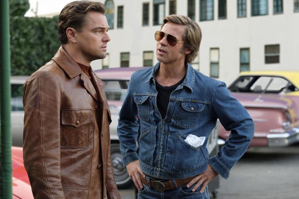 In “Once Upon a Time ... in Hollywood,” a fading TV star (Leonardo DiCaprio, left), and his stunt double (Brad Pitt) contemplate their future.