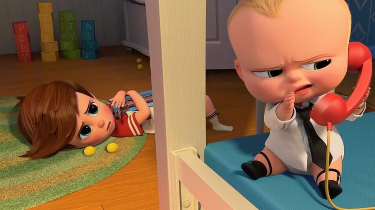 Tim (voiced by Miles Bakshi) discovers a surprising secret from Boss Baby (Alec Baldwin).