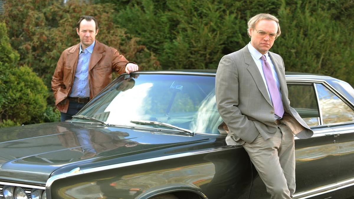 
Actors portraying Seattle detectives Bob Keppel (right) and Roger Dunn don’t utter their murder suspect’s name until well into “Serial Thriller’s” second hour. 
