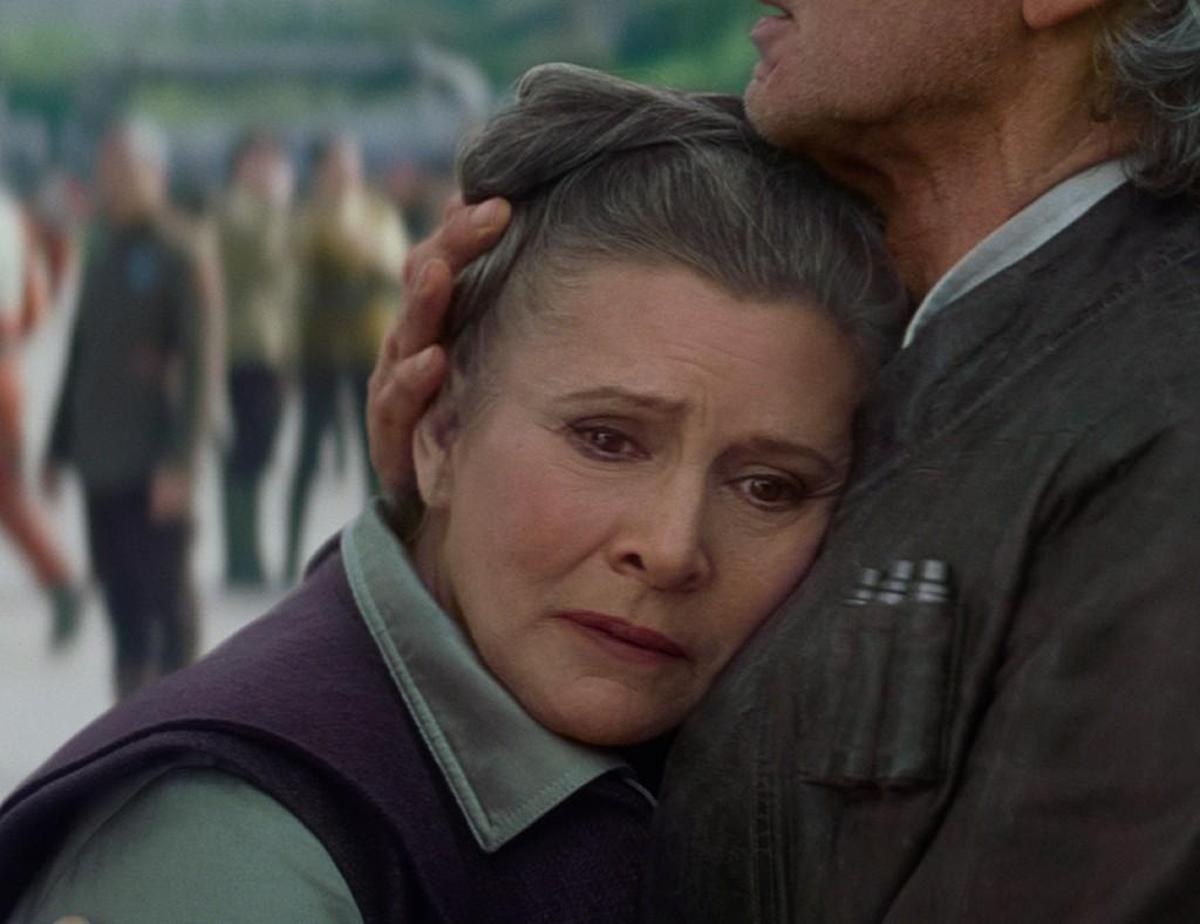 Gen. Leia Organa seeks comfort with Han Solo in “The Force Awakens.”