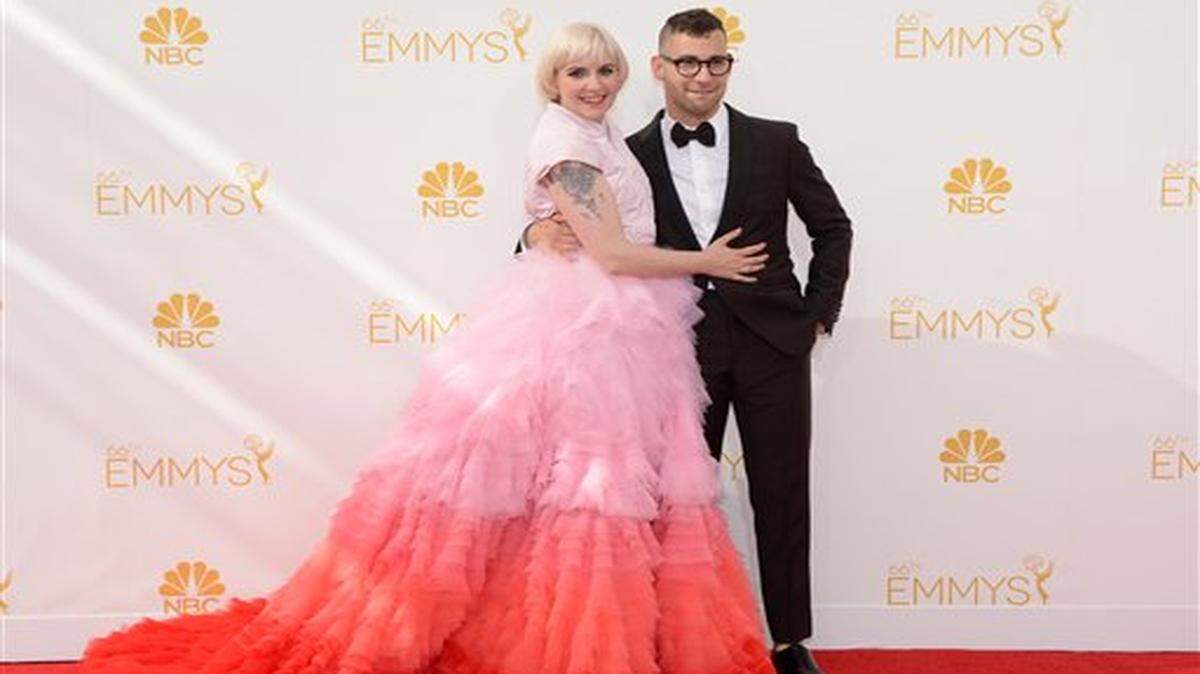 
IMAGE DISTRIBUTED FOR THE TELEVISION ACADEMY - Lena Dunham, left, and Jack Antonoff arrive at the 66th Primetime Emmy Awards at the Nokia Theatre L.A. Live on Monday, Aug. 25, 2014, in Los Angeles. (Photo by Evan Agostini/Invision for the Television Academy/AP Images)
