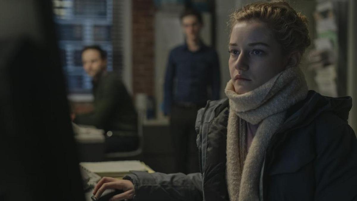 Julia Garner plays the low assistant on the totem pole in the office of a New York mogul.
