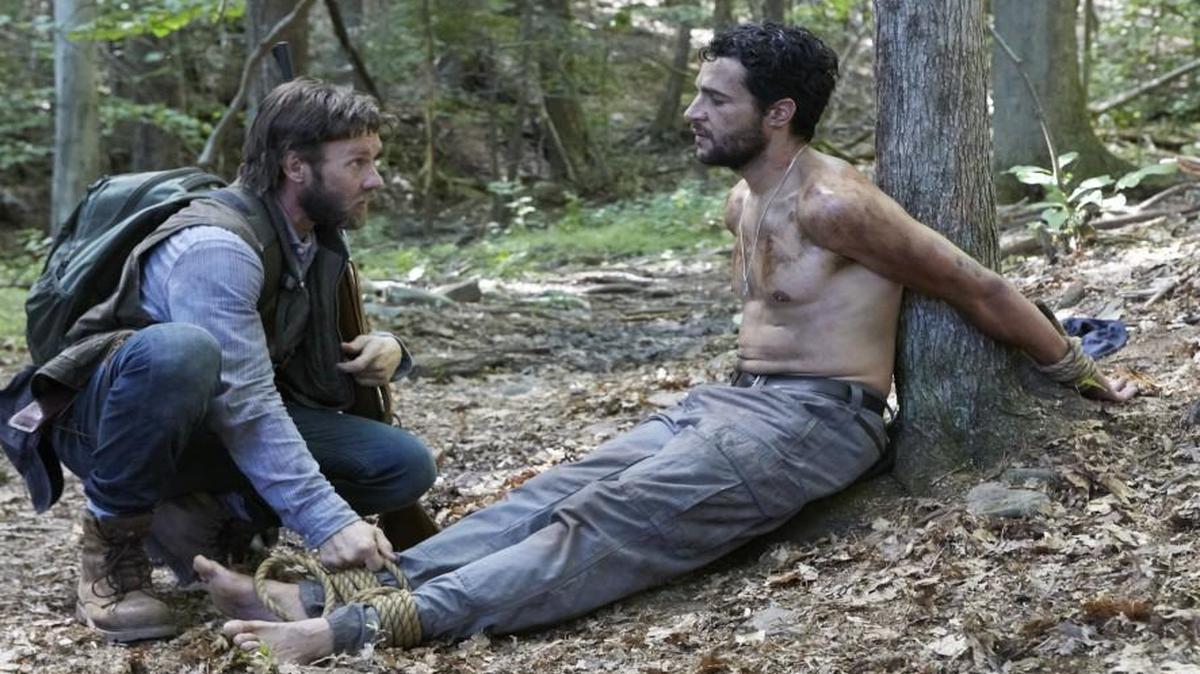 Paul (Joel Edgerton, left) is at first wary of a stranger (Christopher Abbott) seeking his help in an apocalyptic world.
