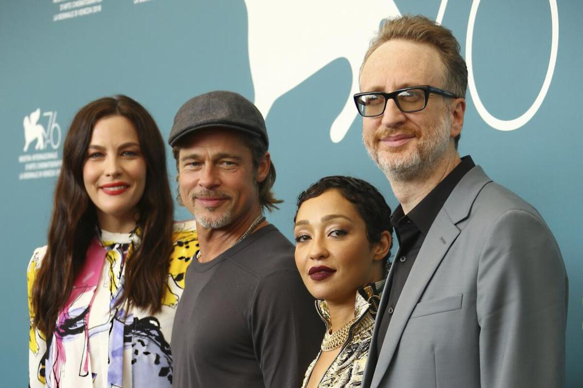 The “Ad Astra” stars, from left, Liv Tyler, Brad Pitt and Ruth Negga, and director James Gray pose for photographers on the red carpet at the Venice Film Festival in August.