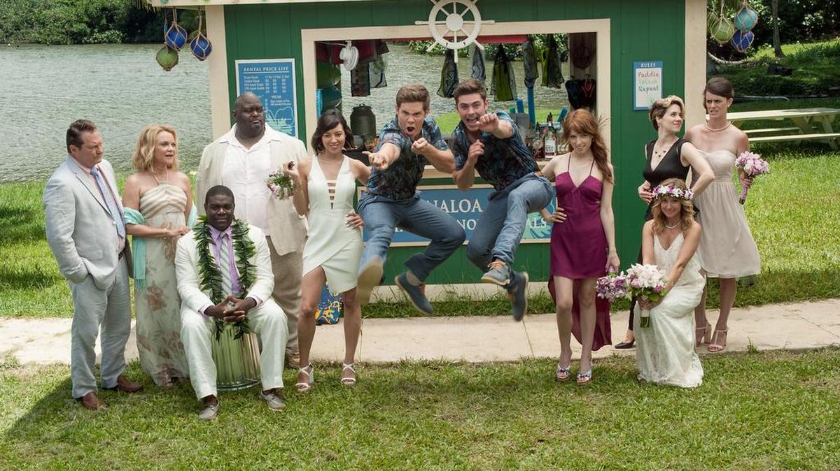 In “Mike and Dave Need Wedding Dates,” hard-partying brothers Mike (Adam Devine, center left) and Dave (Zac Efron, center right) place an online ad to find dates for their sister’s Hawaiian wedding. But the women (Anna Kendrick and Aubrey Plaza) outsmart and out-party them.