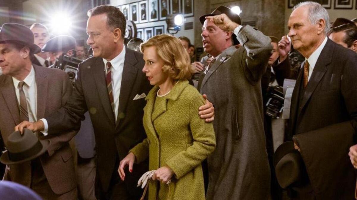 Tom Hanks (second from left) plays a lawyer who finds himself thrown into Cold War intrigue in “Bridge of Spies.” Amy Ryan and Alan Alda (right) also star.
