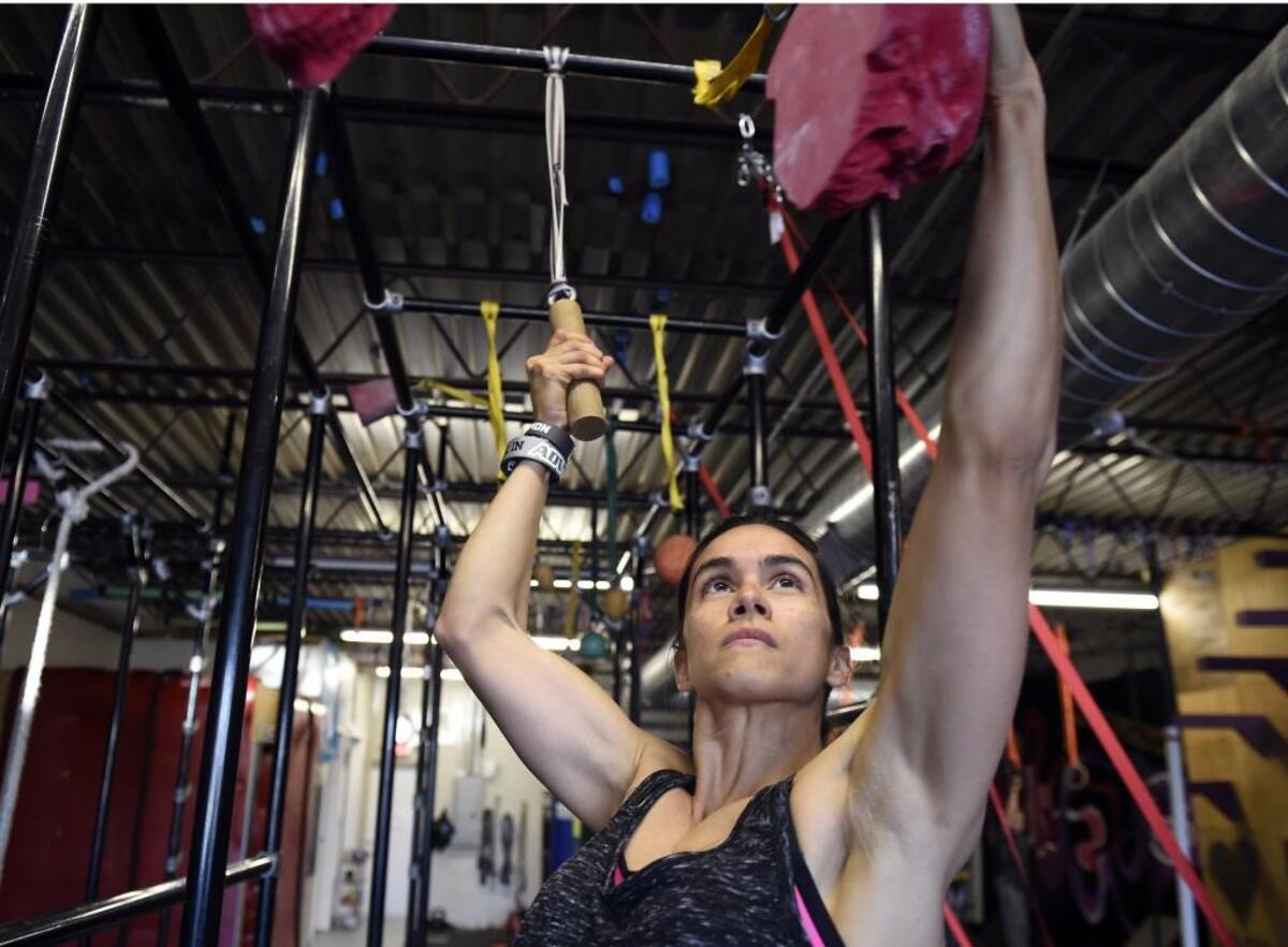 Independence school teacher Annie Dudek appeared briefly on Monday’s “American Ninja Warrior” and was one of five women who qualified for the next round.
