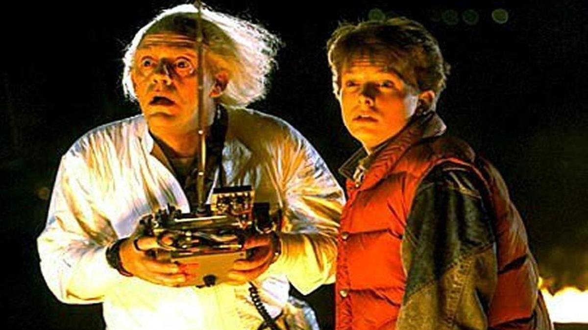 In “Back to the Future,” Doc Brown and Marty McFly (Christopher Lloyd and Michael J. Fox) travel back in time in a DeLorean time machine.