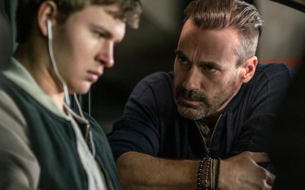 In “Baby Driver,” a scruffy Jon Hamm is a criminal named Buddy, who confronts his group’s masterful driver (Ansel Elgort).
