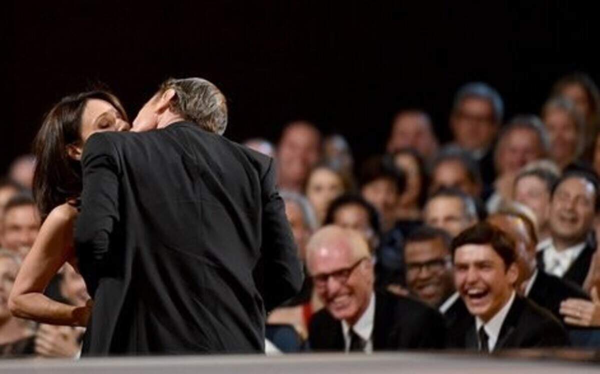 
Image distributed for the Television Academy - Julia Louis-Dreyfus, left, and Bryan Cranston kiss at Monday’s 66th Primetime Emmy Awards at the Nokia Theatre L.A.

