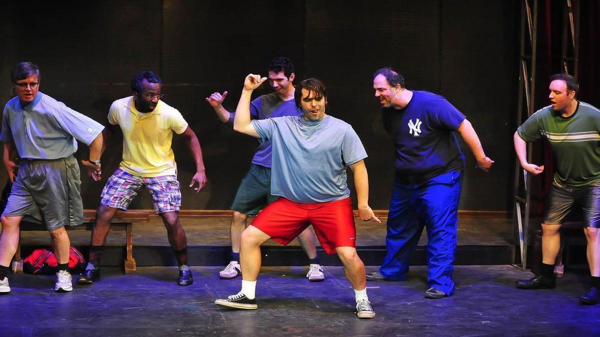 
Drew Starlin as Jerry (center) leads a rehearsal with the guys in “The Full Monty.” Also pictured, from left: Bob Paisley, Quincy Nile Kuykendall, Jakob Wozniak, Vincent Onofrio Monachino and Adam Henry.
