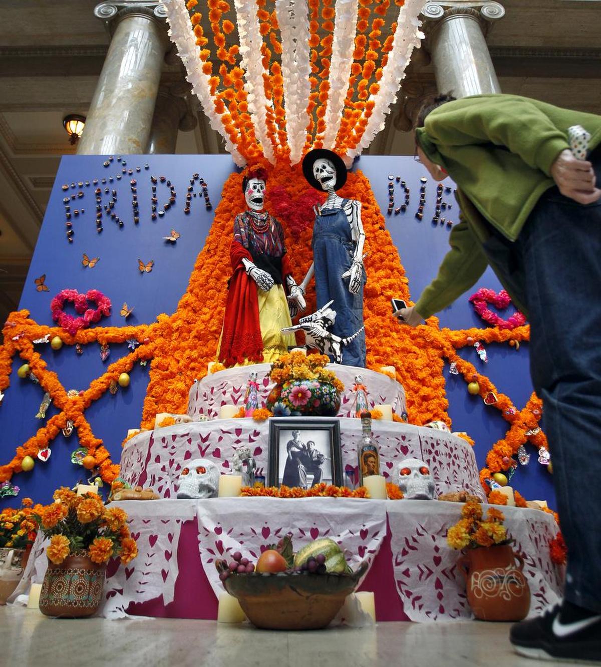 An altar honoring artists Frida Khalo and Diego Rivera was installed in Kirkwood Hall at the Nelson Atkins for a past Dia de los Muertos celebration.