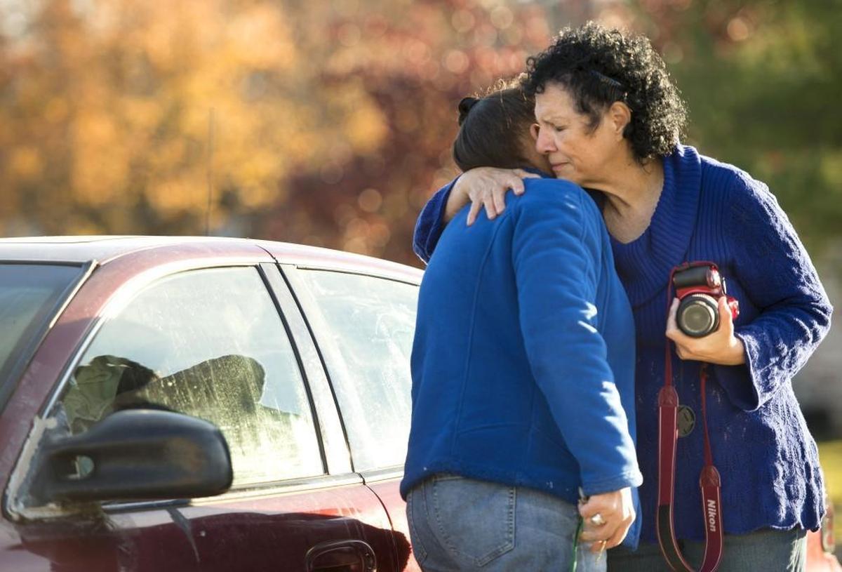 Olathe photographer Sharon Rodriguez, right, tries to raise awareness for Johnson County’s homeless population by photographing and interviewing people like Randi (left), a woman who was forced to live in her car after losing her home.