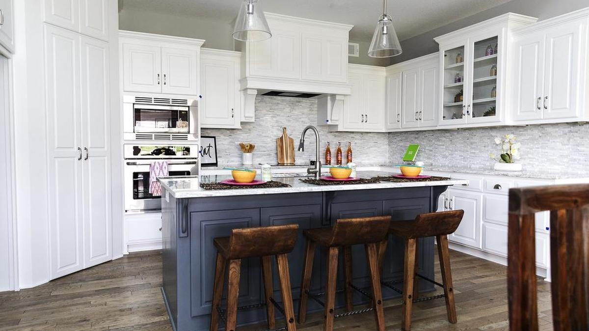 In the Kendleton model in the Creekmoor Villas community in Raymore (Tour #20), the envy-worthy kitchen is the star of the home.