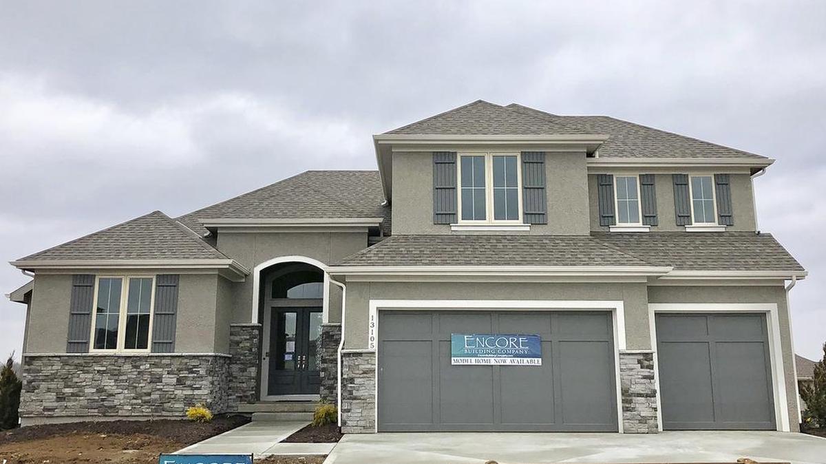 Spring Parade of Homes entry 239 is Encore Building Company’s Monterey 1 ½-story, located at 13105 W. 172nd St. The home features a premium cul-de-sac home site, which backs to community green space and a walking trail; a walkout basement, a covered deck, a main floor master bedroom and is available for a 30-day closing, priced at $554,900.