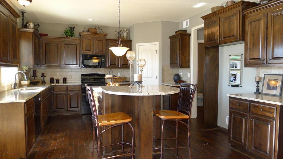 This beautiful and spacious granite island truly is the heart of this home.