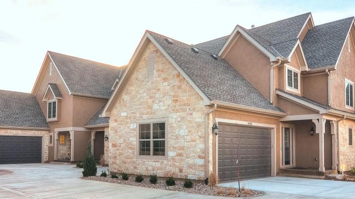 Full stucco and stone exterior brings out the cottage-like feel of the community. A 50-year roof and extra-wide 6-inch gutters will help maintain the longevity and beauty of each home.