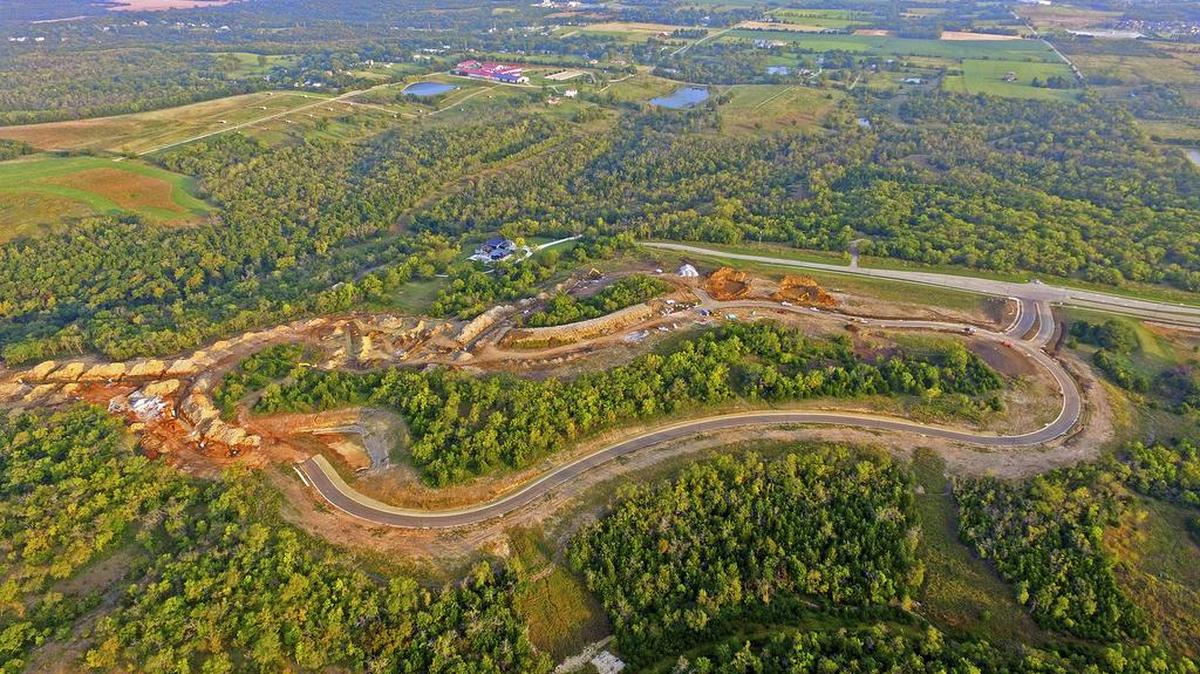 The new Canyon Creek Point neighborhood is situated atop a high ridge with deep stream valleys on two sides. City-owned parkland and a natural conservation area surround the community, allowing sweeping views of nothing but nature.