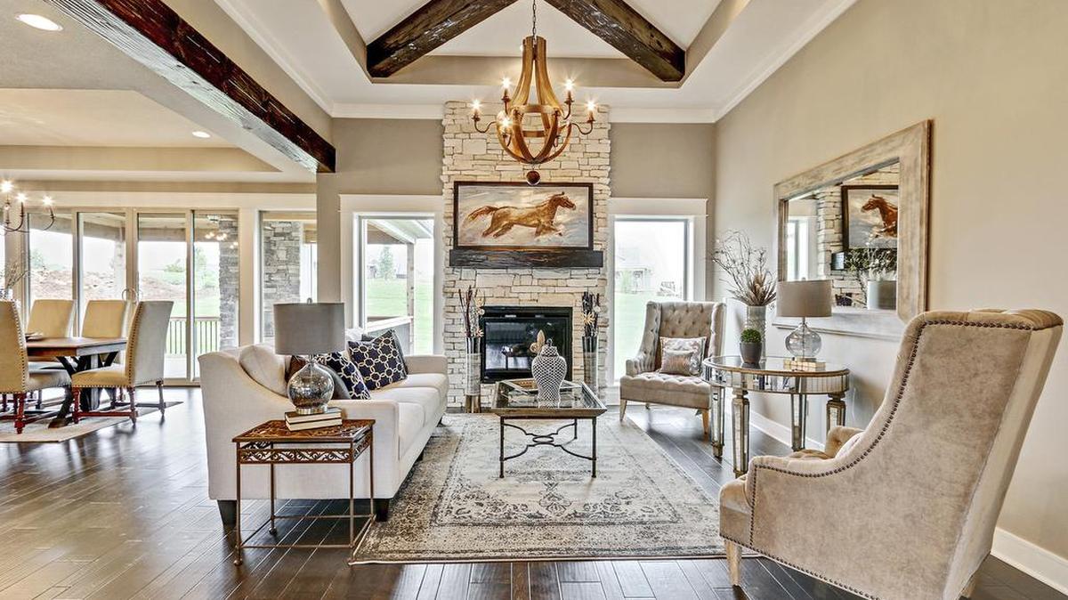 An open floor plan and rich architectural details create an inviting living space in JFE Construction’s Covington I reverse 1.5 story.