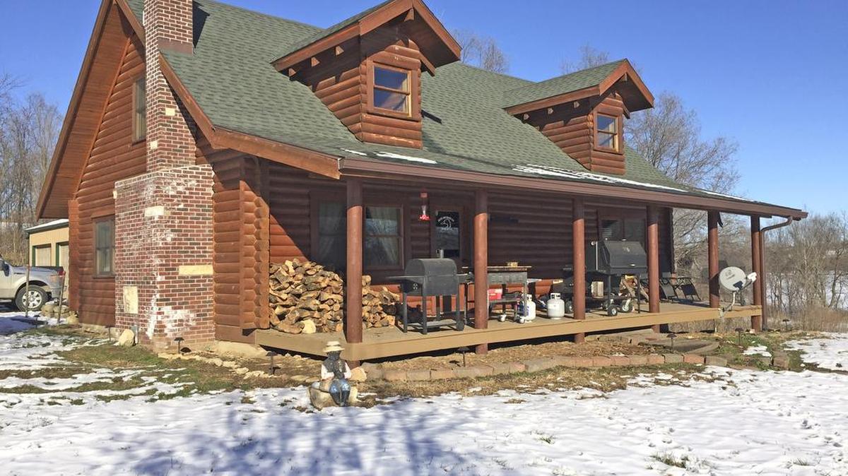 This lodge sits on 3.6 acres in the heart of 100 acres not far from the Squaw Creek National Wildlife Refuge. The four-bedroom log structure was built in 2001. It has 3.5 baths, three levels and has a three-stall detached garage area for parking out of the weather.