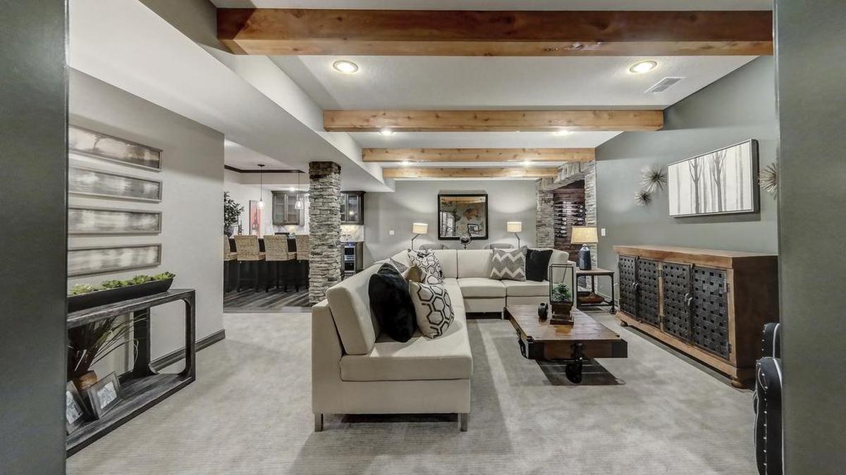 Optional lower level finishes offer increased flexibility for plans in Summit’s awards winning Villa Collection.