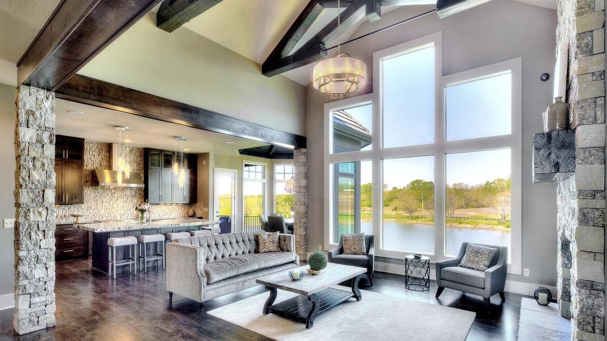 
Perched on a cul-de-sac location at Cottonwood Canyon that overlooks the water, this home, built by Starr Homes, is now available and priced at $979,900. 
