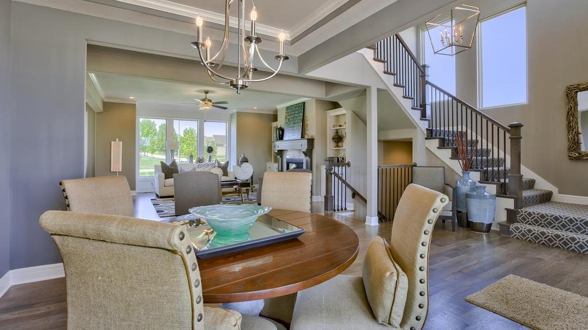 The Irving II, the newest generation design in the Irving floorplan collection by Rodrock Homes, is a striking two-story geared for family living. Tour the professionally decorated model in Hills of Forest Creek; can also be built in Gleason Glen.