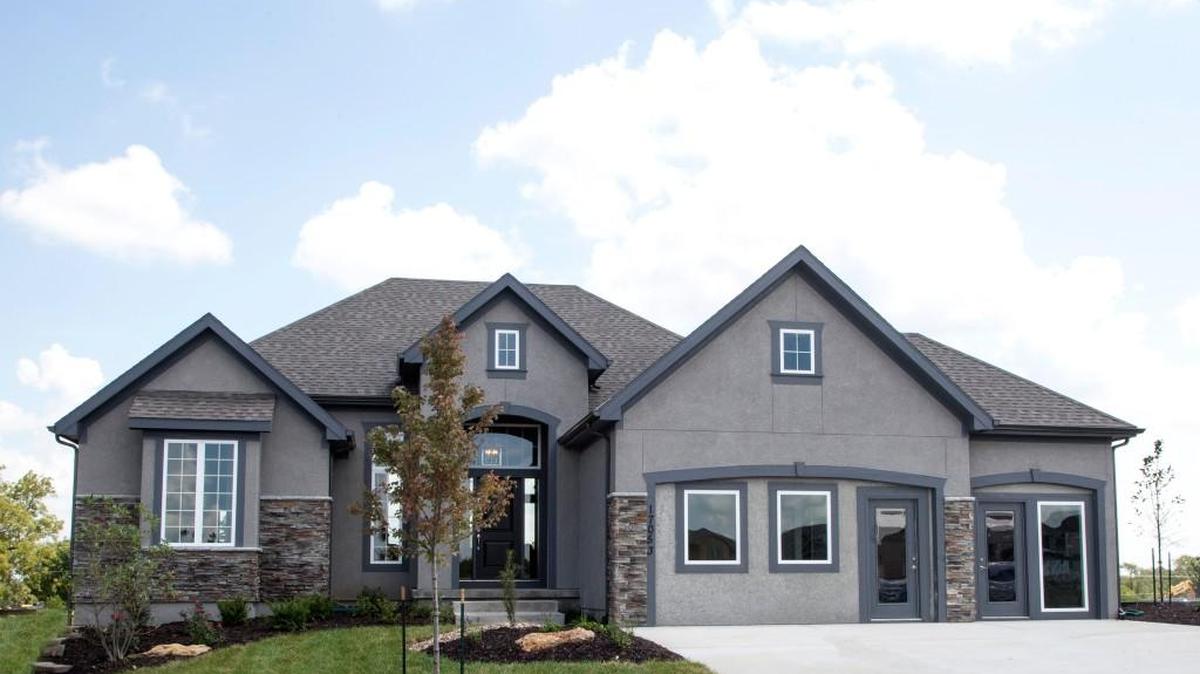 The Morgan by New Mark Homes in Maple Ridge of Terrybrook Farms is a reverse 1.5-story, 3,328 square-foot floor plan featuring four bedrooms, three baths, a three-car garage and airy 12-foot great room and entry ceilings.