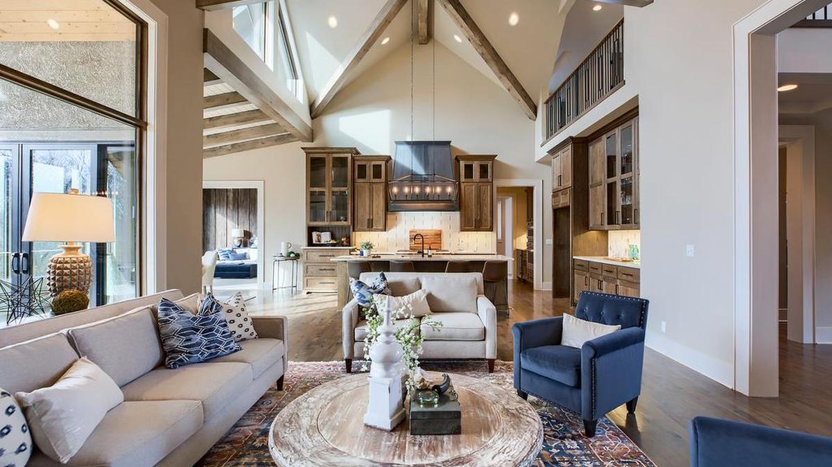 Rodrock Development is immensely proud to have 36 years of consecutive wins in the Spring Parade of Homes. Among them is Ashner Construction’s Artisan III in Sundance Ridge. This 1.5-story Gold award winner boasts more than 5,075 square feet of finely finished living space, with stunning accents throughout, including exposed truss beams and a floor-to-ceiling stacked stone fireplace complete with built-ins in the Great Room.