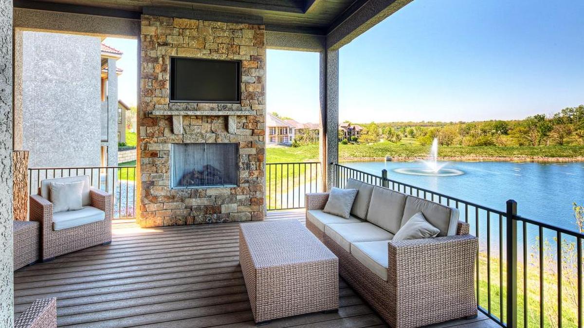 This luxurious back porch overlooks the course at Canyon Farms Golf Club.