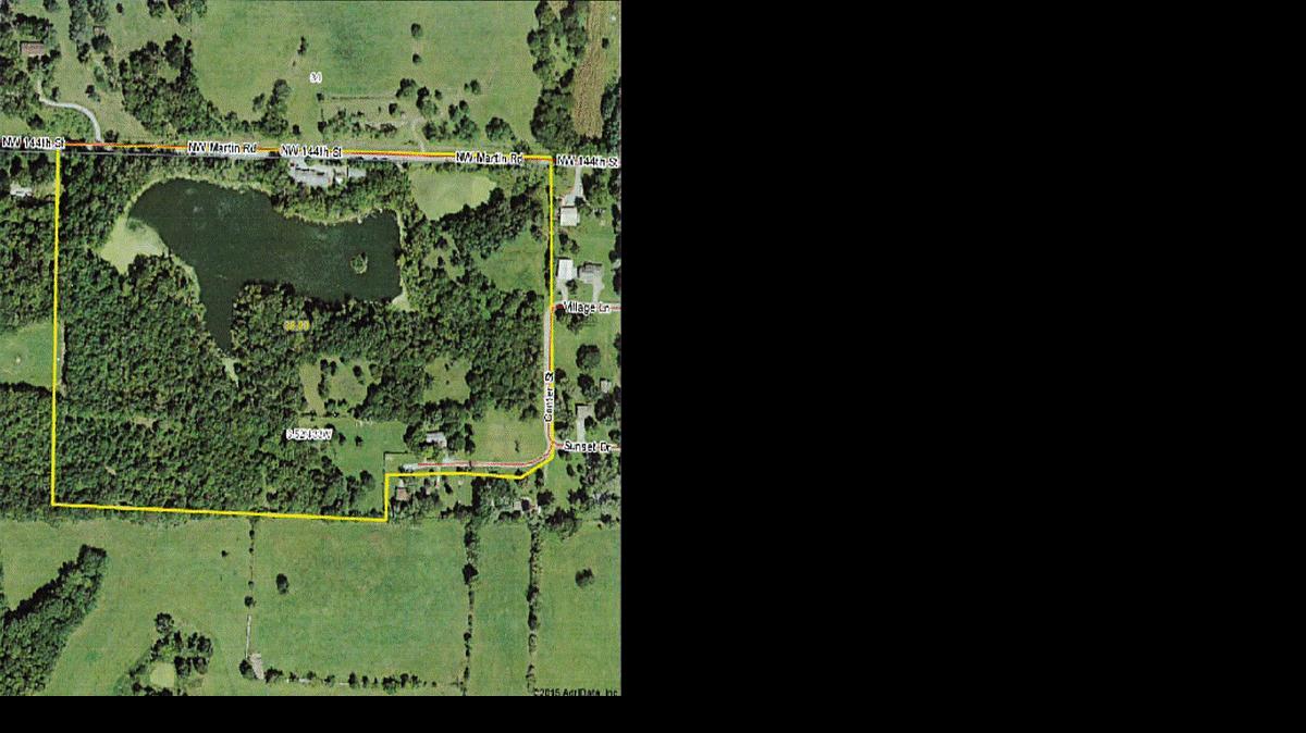 
This aerial view shows the 39-acre Bell Lake property, including the lake and hardwood trees surrounding it.
