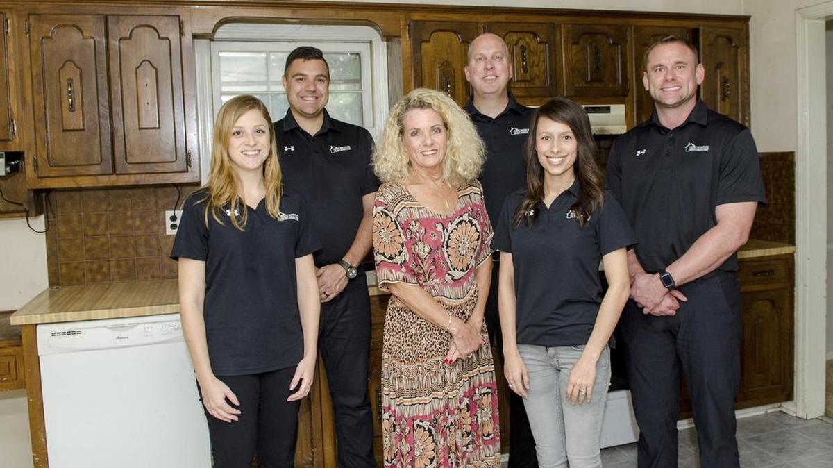 Denise Canon recently worked with the House Buyers KC team to sell the Lenexa home where she and her husband, Milling, raised their family. From left: Jane Boyd, Kyle Walchshauser, Denise Canon, Tom Bell, Katie Mason and Chad Lower.