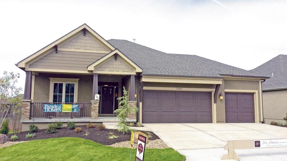 Tom French offers this reverse 1 ½-story located at 13204 W. 170th St. The home features a covered front porch, walkout basement, covered deck, four bedrooms and backs to a private greenspace with tree preserve and walking trail. Priced at $496,950, the home has 30-day delivery available.