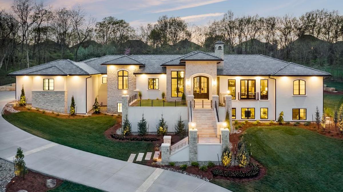 Cecil & Ray Homes’ newest estate home in the Village of Loch Lloyd offers unrivaled indoor and outdoor living spaces for people and pets. Photo by Nate Sheets Photography