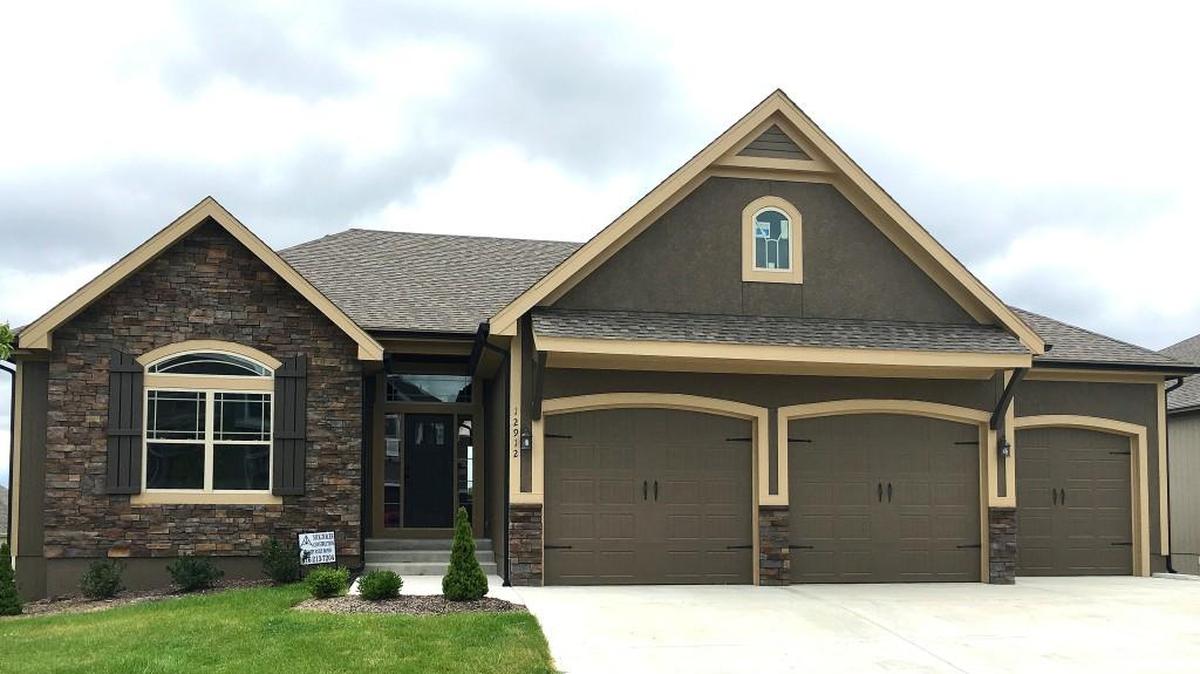 The Craftsman reverse 1½-story by Nick Zvacek Construction is located at 12912 W. 169th St. and features a covered deck, a covered patio, a home theater system including a flat-screen TV and a walkout basement backing to green space. Priced at $469,000, the home has a 30-day close available.