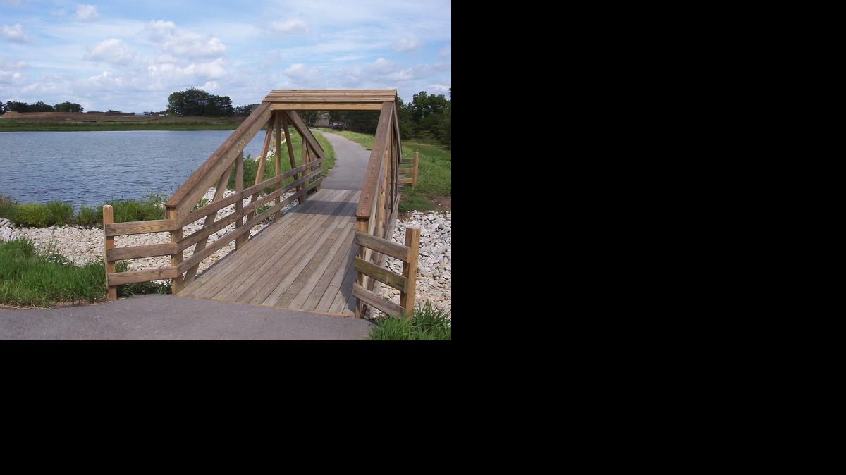 
Harbor Lake is adjacent to Smithville Lake and features amenities such as a pool, a community lake, common areas with native wildflowers and nearly a mile of hard-surface walking trails. The trail is highlighted by a wooden bridge that spans the spillway of the lake.
