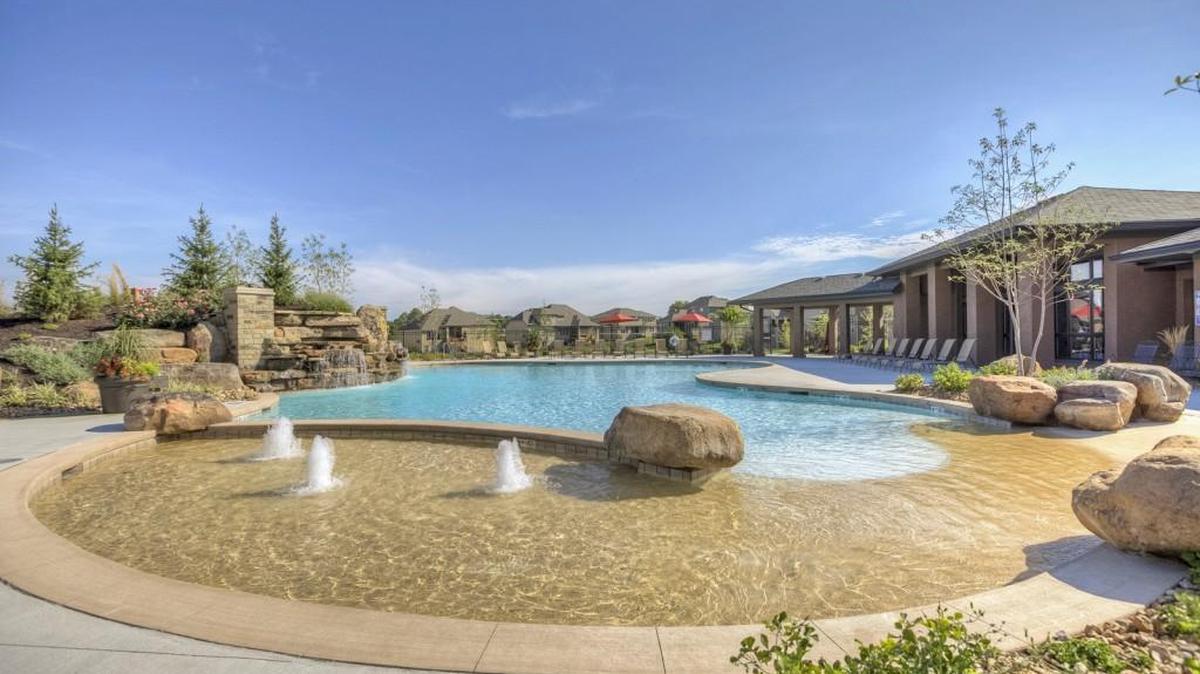 The lush Summerwood resort-style pool is just the beginning of the amenities offered in the premier community, located in the top-rated Blue Valley School District.