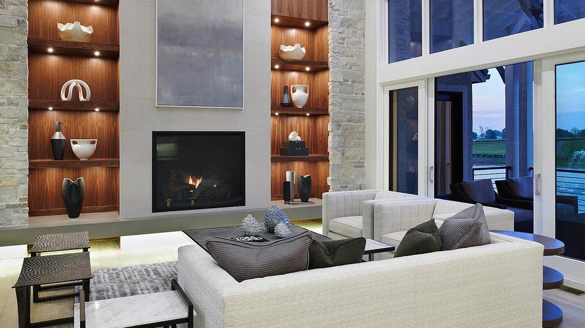 Imagine entertaining in The Silverton by Rodrock Homes in The Enclave of Terrybrook Farms where the living room features custom walnut shelves, a linear quartz hearth and an imported Italian large-format textured tile fireplace wall with a large bank of windows, inviting the outdoors in. The custom home is for sale at $1.5 million.