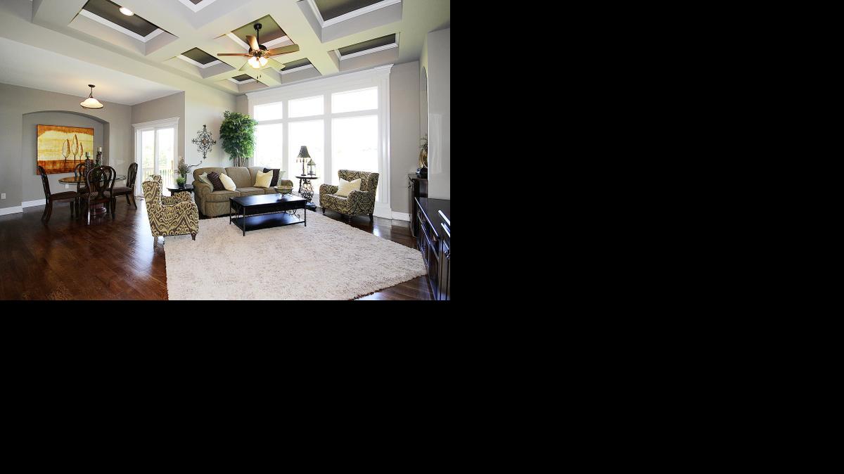 
The Villas of Sunnybrook offers homeowners luxurious comfort without compromise. The Sedona model by Calyn Homes features an all stucco exterior, elegantly coffered great room ceiling, granite counter tops and iron spindle staircase. 
