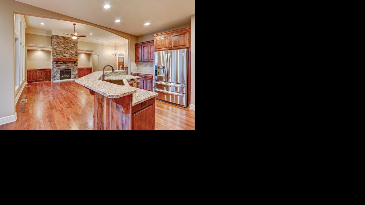 
Frisbie-Carter Custom Homes is completing a reverse 1
1/2-story Barbados plan at West Ridge at Weatherby that offers 3,000 square feet of living space.
