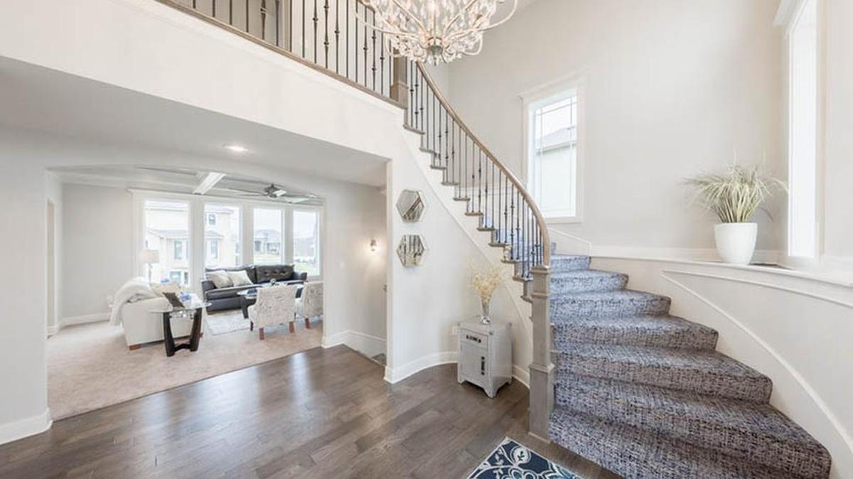 In an exciting move, Rodrock Development’s Greens of Chapel Creek is selling its model row, including the splendid Sirabella by Dreams & Design Building. The home offers a breathtaking 2-story entry with elegant curved staircase, 5 bedrooms, 4.5 baths, and upgraded walkout lower level, complete with family room, bar area, additional bedroom and bath.