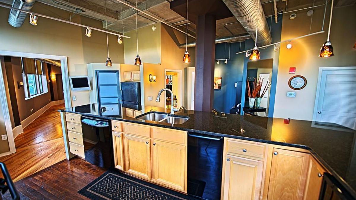 This two-bedroom loft is available in downtown Kansas City's iconic Western Auto building. Priced at $499,000, the loft includes nearly 2,500 square feet of living space complete with a state-of-the-art kitchen.