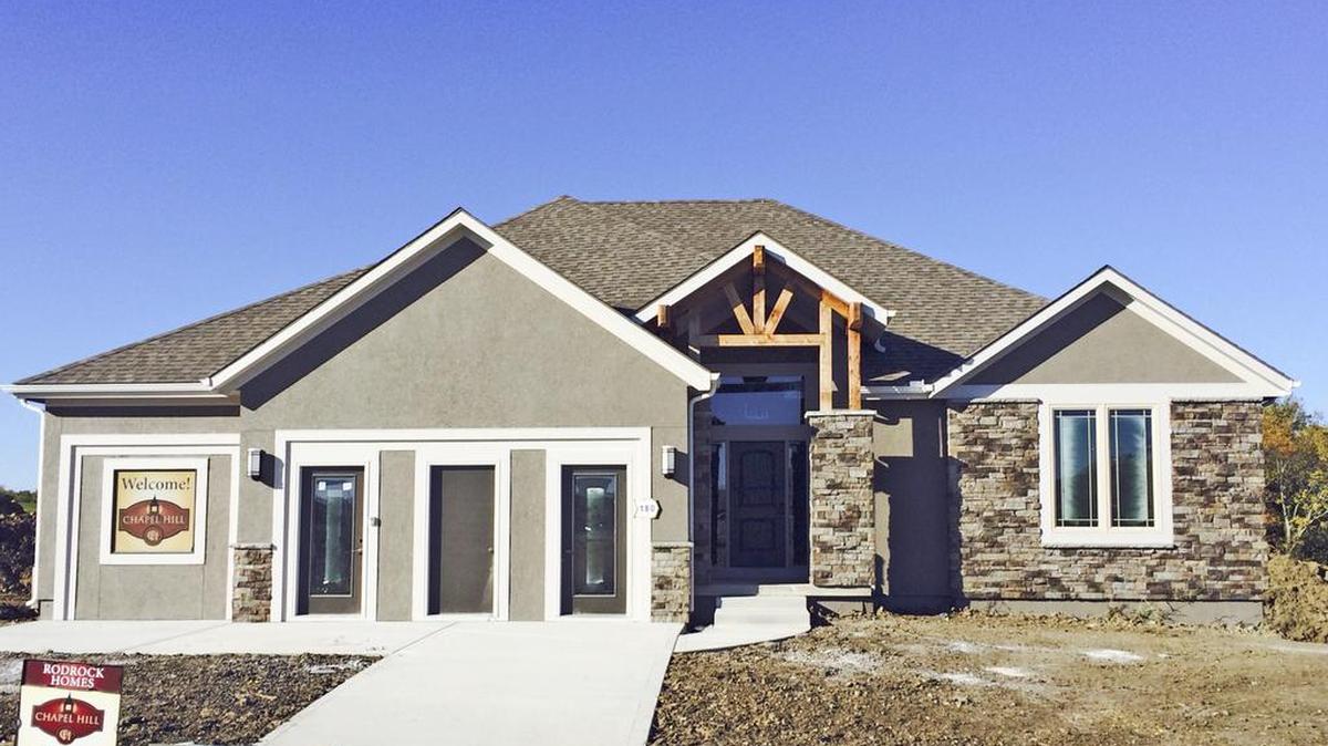 
Rodrock Homes’ new Dillion Reverse 1
1/2-story at 16708 Haskins St. will feature a covered deck with see through-fireplace, enameled white kitchen and box-beam ceiling in the great room. It will be finished and open for viewing later this month. 
