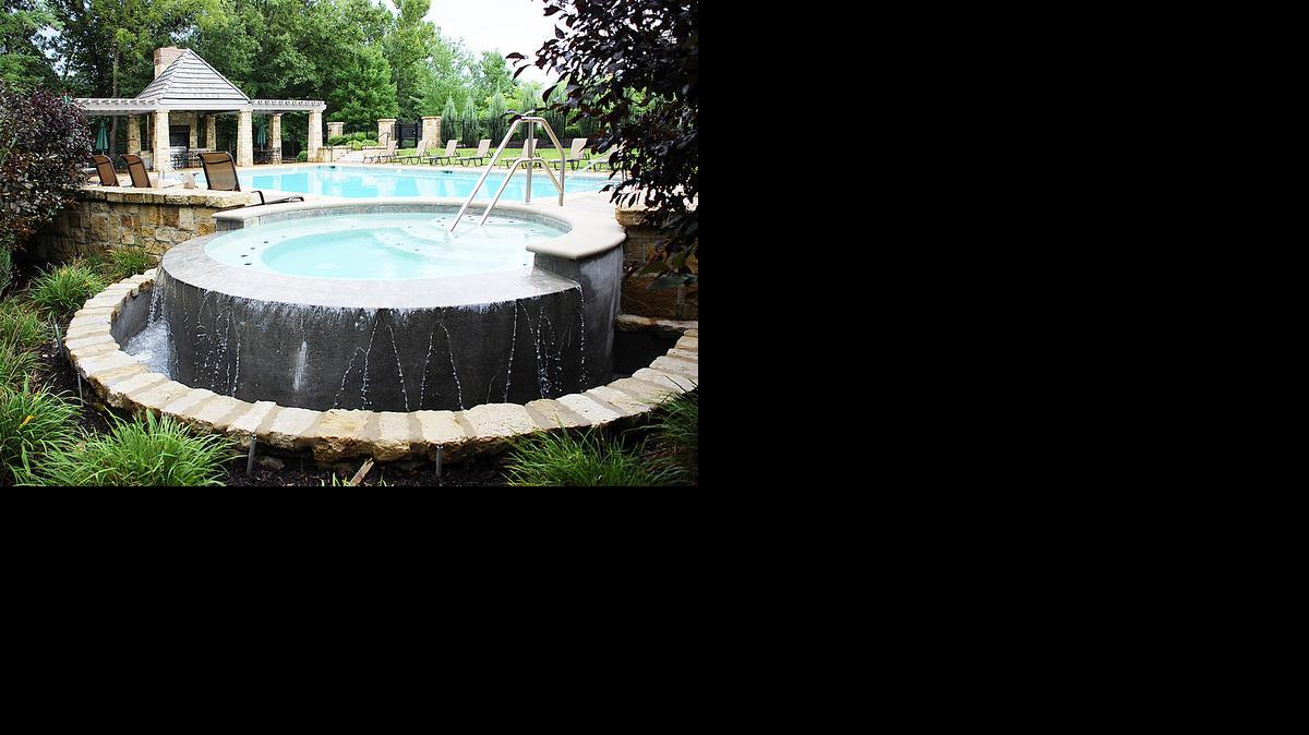 
Residents of Shoal Creek Valley enjoy the waterfall hot tub, fountain pool, patios and barbecue pavilion at the Gate House.
