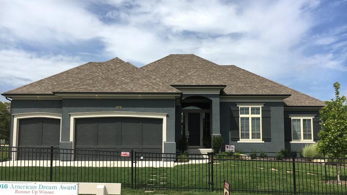 The Brookridge II ranch reverse by Don Julian Builders features a stunning floating staircase, cathedral beam ceiling, walk-behind bar, a walkout homesite, three bedrooms on the main level and boasts over 3,500 square feet. Located at 16716 Haskins, the home is base priced at $420,866 plus lot.