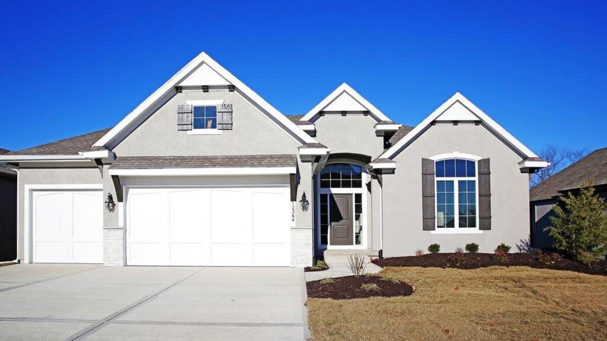 Located just west of Highway 7 on 119th Street, Rodrock Development’s Forest View is a neighborhood that’s truly a world apart. Among the move-in ready homes in the community is Hilmann Home Building’s Chesapeake II, a stylish reverse that sits on a lush wooded walkout lot, priced at $509,950. This home offers gorgeous random-width hardwood floors throughout the entry, breakfast room and Great Room, and a stone corner fireplace accenting a wall of windows that flood the main level with natural light and gorgeous views.