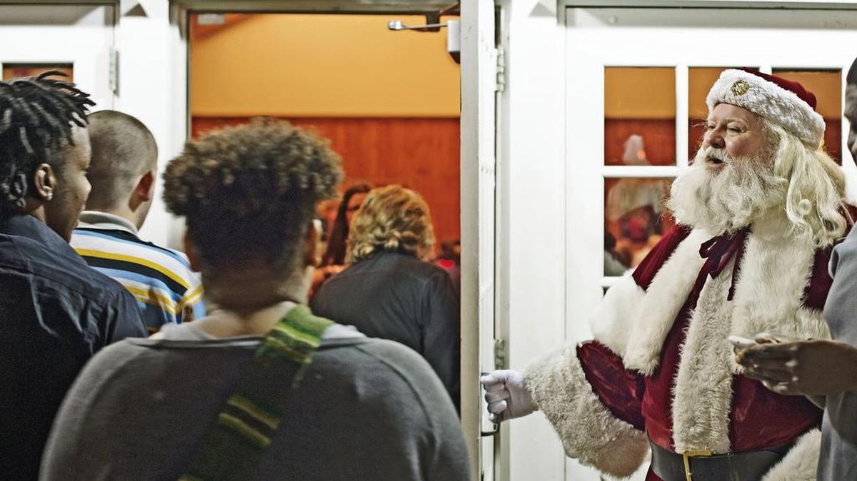 Santa welcomes area foster-care children to the Darol Rodrock Foundation’s annual Holiday Dinner & Sleigh Ride last year at the Lodge of Ironwoods. More than 150 children enjoy a catered dinner, “sleigh rides,” carols, and a gift to kick off the holiday season.