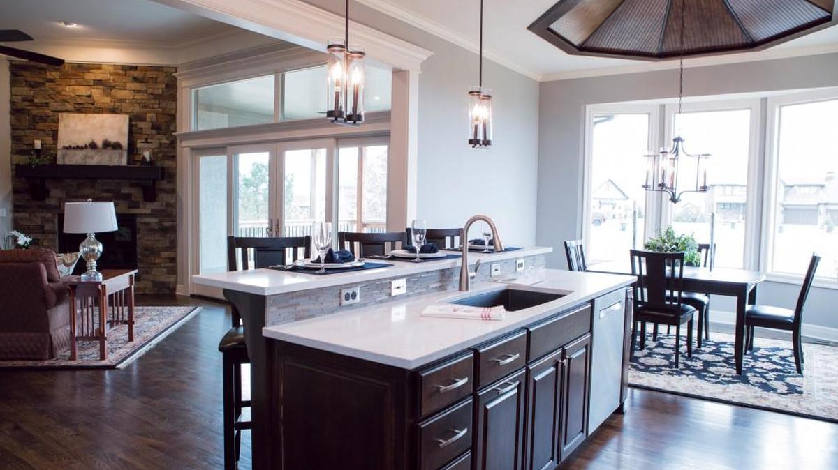 Two homes are immediately available in The Enclave of Sunset Hills, one of three neighborhoods in the Communities of River Ridge. John Stewart Custom Homes offers architectural flair at 16216 Manor Rd. in a reverse 1½-story home priced at $600,000.