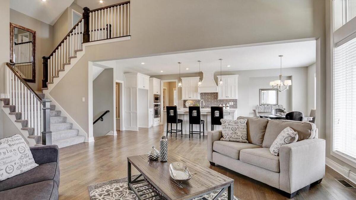 Tour #242 in Covington Creek – winner of an American Dream Award! An open floor plan and rich architectural details create an exceptional living space.