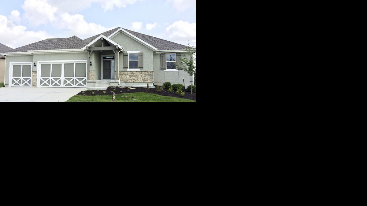 
This Augusta ranch reverse home by Rodrock Homes has three bedrooms on the first floor and one on the lower level, as well as box-beam ceilings and a see-through fireplace from the great room to the covered deck. Three are available, priced from $436,000 to $466,500.
